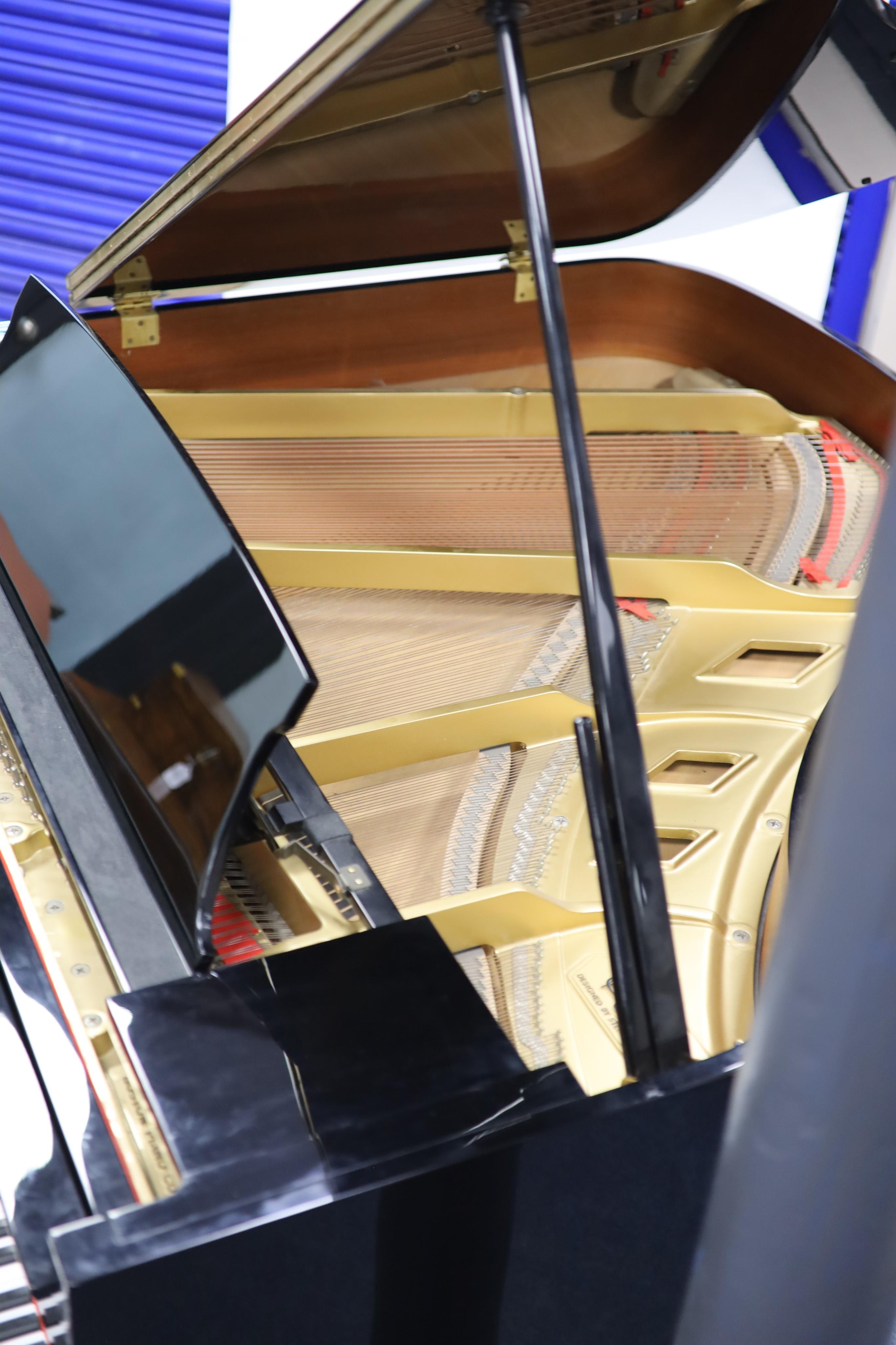 A Steinway & Sons Boston 156 ebonised boudoir grand piano H 102cm. W 146cm. D 150cm.